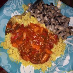 A picture of Rice nd beans with carrot stew.