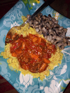 A picture of Rice nd beans with carrot stew.