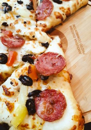 A picture of Pepperoni and Pineapple Pizza.