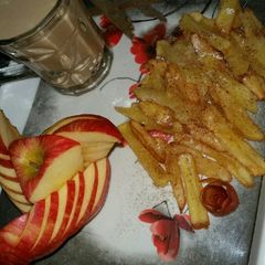 A picture of Apple fries with tea.