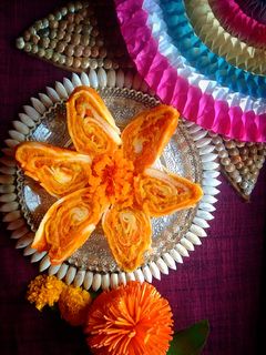 গাজর লাড্ডুর রোল পিঠা (gajor laddur roll pithe recipe in Bengali)) রেসিপির প্রধান ছবি