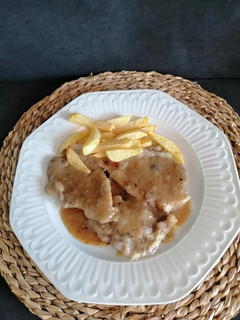 Una foto de Filetes de cabeza de lomo en salsa de cerveza