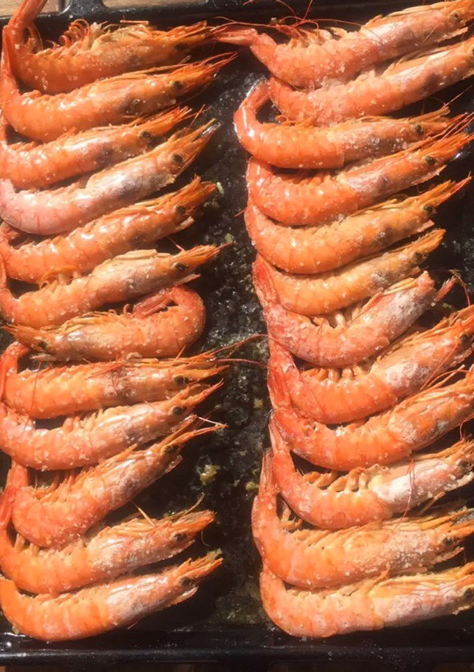 Una foto de Gambones al horno al whisky