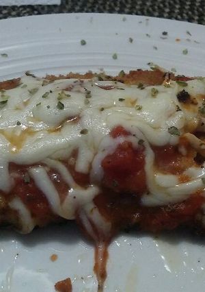 Una foto de Milanesa de pollo a la Napolitana