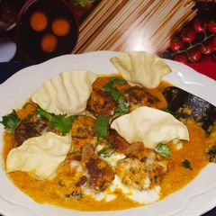 A picture of Papaya Spinach Kofta Curry.