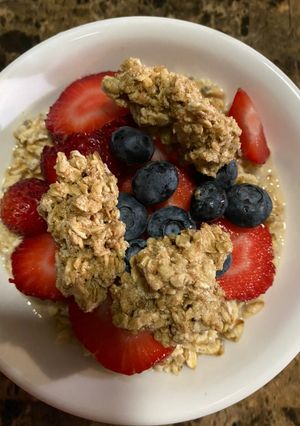 A picture of Cereal with fresh fruits.