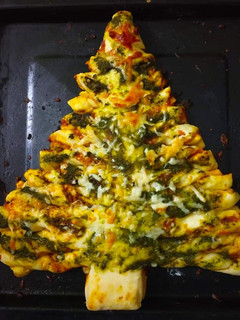 A picture of Stuffed spinach and cheese Xmas bread.