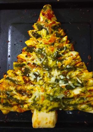A picture of Stuffed spinach and cheese Xmas bread.