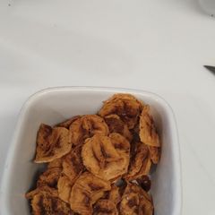 A picture of Dehydrated banana 🍌 chips. Dusted with cinnamon.