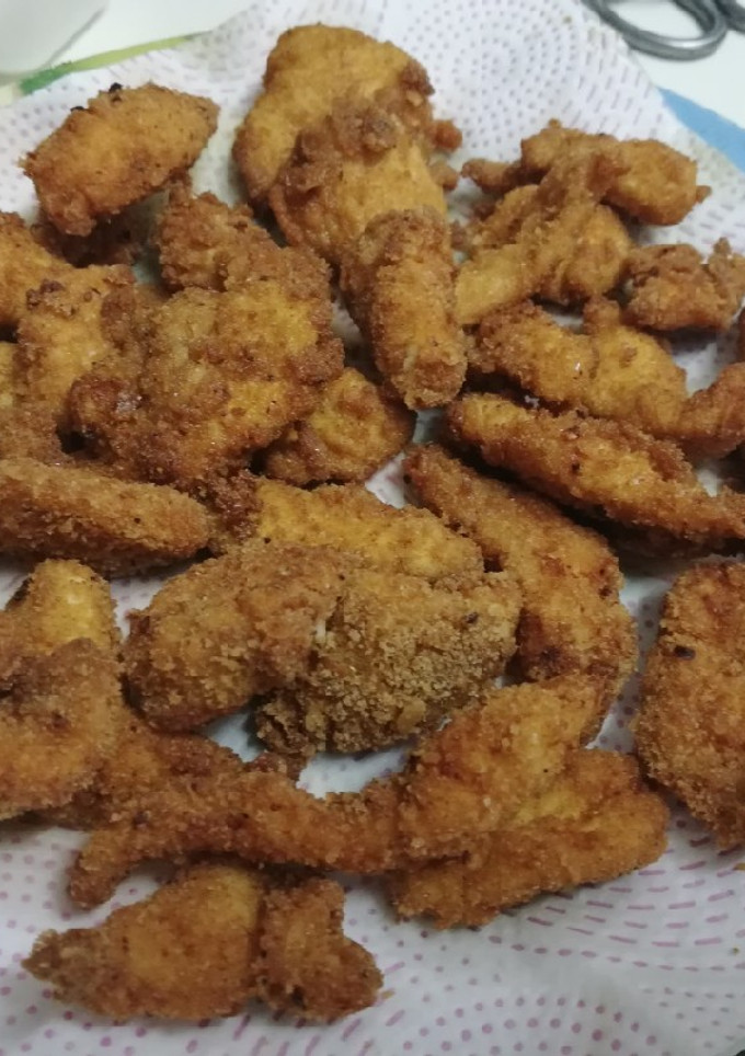 Una foto de Fingers de pollo al curry picantes 🌶🐔