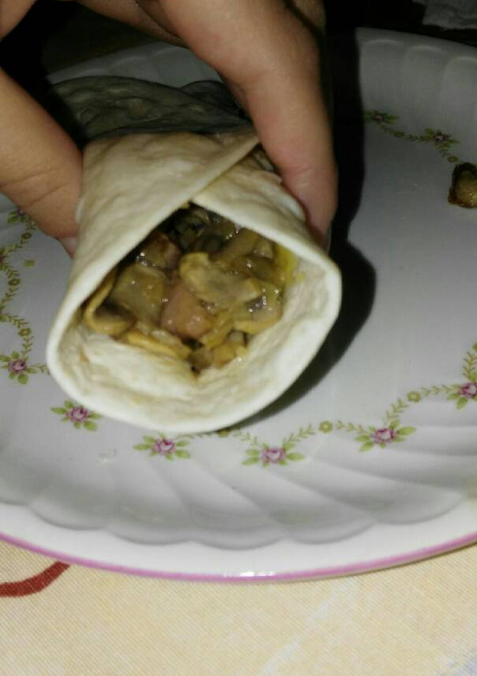 Una foto de Fajita de champiñones y bacon