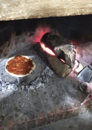 Una foto de Pizza a la piedra