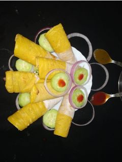 ডিম বেসনের মিনি রোল (dim besoner mini roll recipe in Bengali) রেসিপির প্রধান ছবি