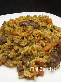 Una foto de Arroz con higaditos de pollo