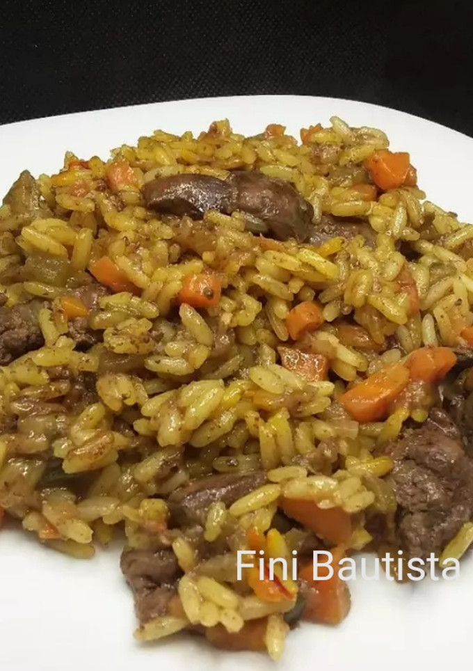 Una foto de Arroz con higaditos de pollo