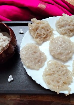 A picture of Sabudana Idiyappam with sweet coconut chutney.