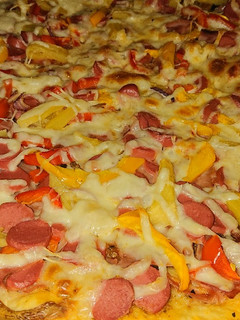 Una foto de Pizza hawaiana con masa salada