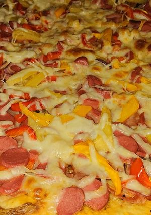 Una foto de Pizza hawaiana con masa salada