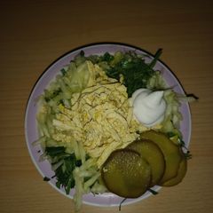 A picture of Smoked tofu,zucchini and pickled cucumber vegan salad.