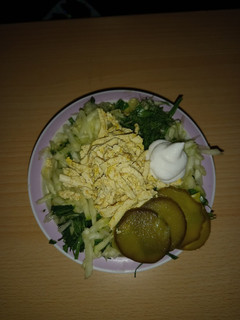 A picture of Smoked tofu,zucchini and pickled cucumber vegan salad.