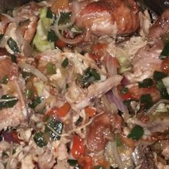 A picture of Grilled chicken in veggies sauce.