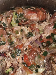 A picture of Grilled chicken in veggies sauce.