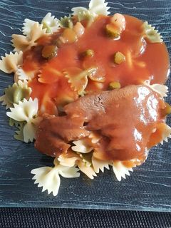 Une photo de Langue de boeuf sauce piquante