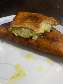 Una foto de Empanadas de cebolla y queso