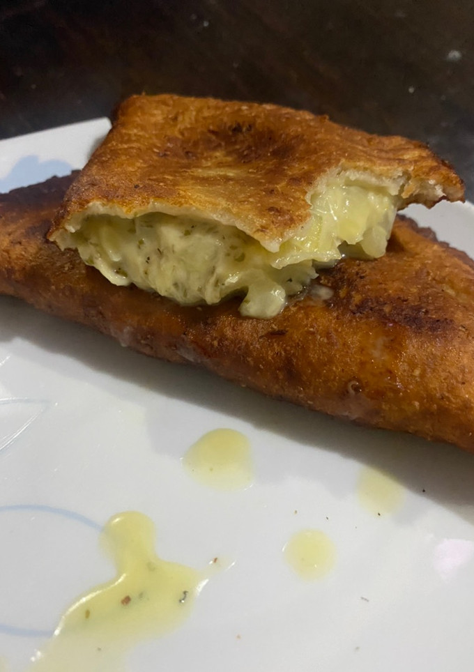 Una foto de Empanadas de cebolla y queso
