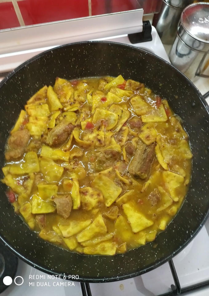 Una foto de Gazpachos manchegos con costillas y magro de cerdo