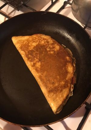 Una foto de Omelette de queso y tomate