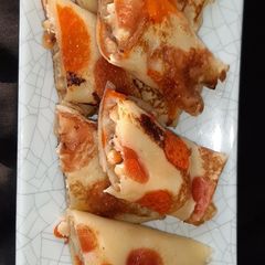 A picture of Banana Pancake stuffed with peanut & cheese.