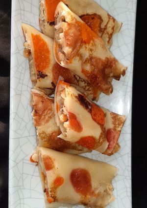 A picture of Banana Pancake stuffed with peanut & cheese.