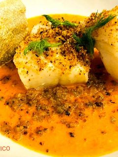 Foto di Filetto di baccalà su crema di pomodori
