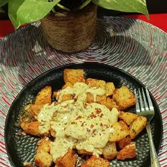 A picture of Cheesey Spicy Garlic Potato.