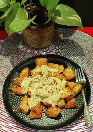A picture of Cheesey Spicy Garlic Potato.