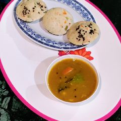 A picture of Rice flour Instant Idlis, Sambar.