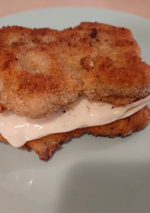 Una foto de Entremuslos empanados con queso