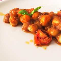 Foto di Gnocchi al pesto di pomodori secchi