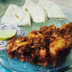 Dry Chicken Masala with Roomali Roti A picture of Dry Chicken Masala with Roomali Roti.