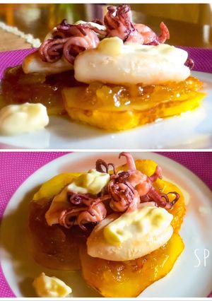 Una foto de Chipirones con allioli en cama de panaderas y cebolla carameliza