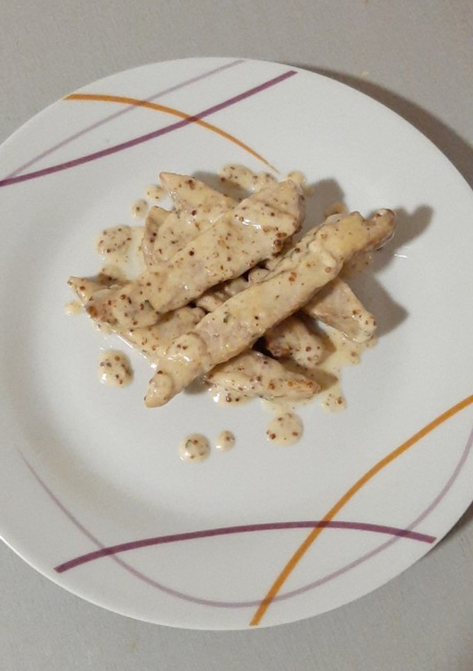 Una foto de Cruceta de cerdo en salsa de mostaza