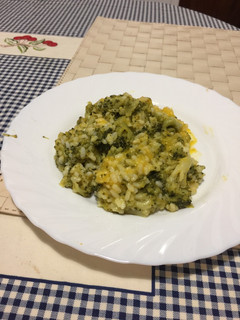 Una foto de Crema de calabaza con arroz y brécol