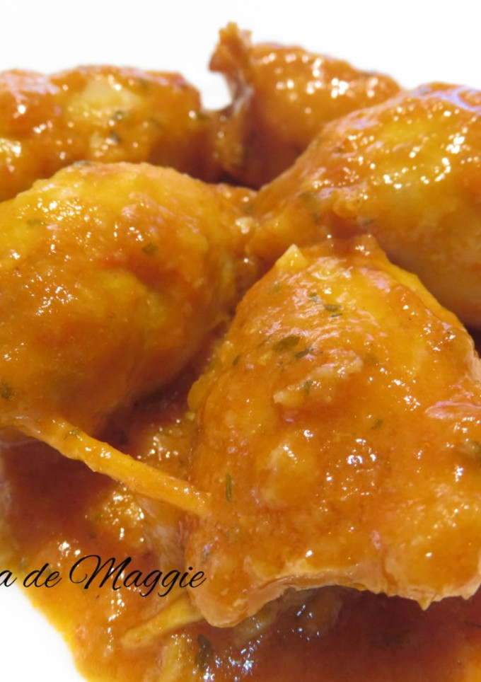 Una foto de Calamares rellenos en salsa