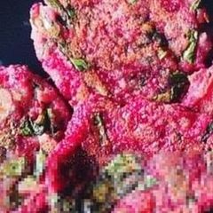 A picture of Beetroot and spinach chilla.