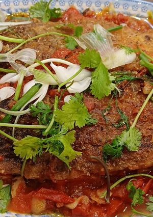 Hình của món Cá trắm đen sốt cà.