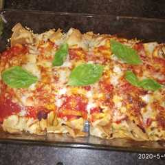 Una foto de Canelones caseros de carne gratinados