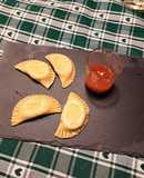 Gyoza pecorino e pepe con salsa di soia