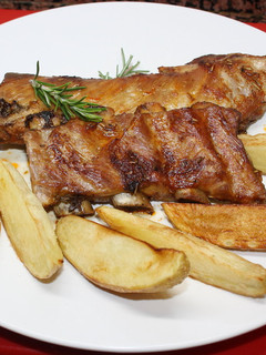 Una foto de Costillas a la miel y romero