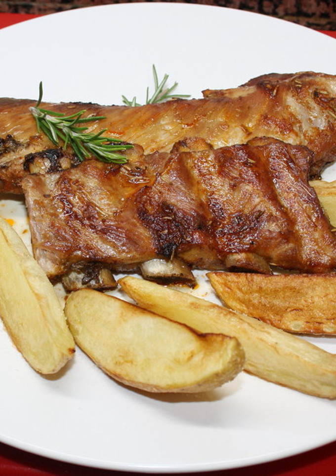 Una foto de Costillas a la miel y romero